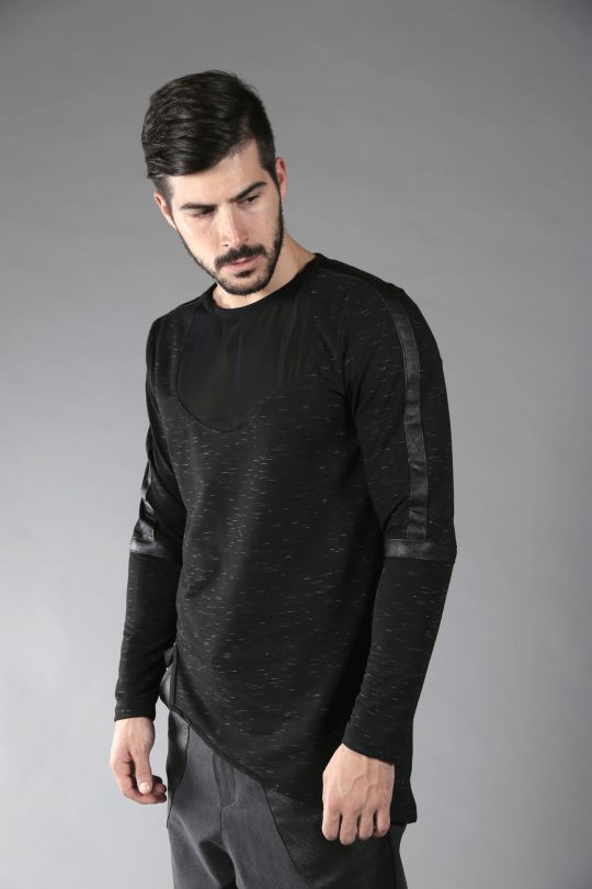 Black men pullover made out of soft cotton lycra fabric which feels nice on your skin. This asymmetric top is designed with fake leather stripes and net free-form parts on front and back