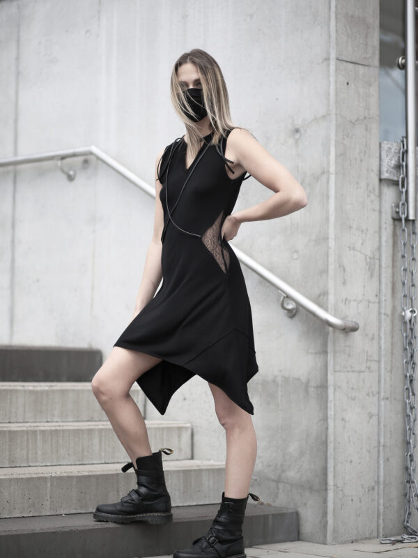 Black viscose dress designed with transparent net and vegan leather stripes.