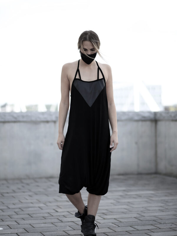 Black viscose jumpsuit designed with vegan leather with pockets. A loose jumpsuit for women in love with dark fashion and alternative fashion style.