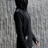 Black cotton hoodie designed with vegan leather stripes.