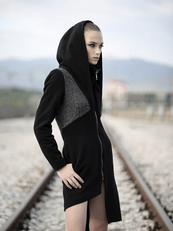 Black coat made of quality blend wool felt in 2 different patterns, with lining. No pockets as it’s slim fit coat.