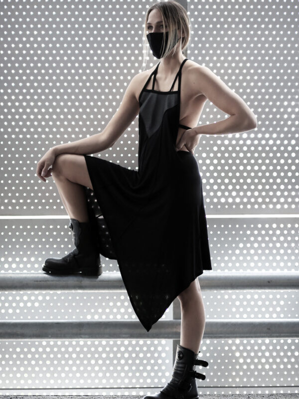 Black viscose jumpsuit designed with vegan leather.