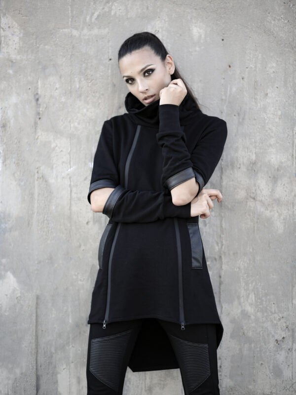 Woman’s loose fit soft cotton hoodie designed with faux leather details. Flawless design and highest quality.