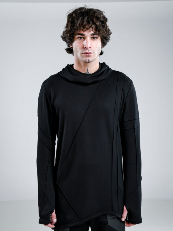 Black Sovereign Top by Kali Rose featuring an asymmetric silhouette, hood, long sleeves with thumbholes and distinctive pinch-stitch detailing, front and back views.