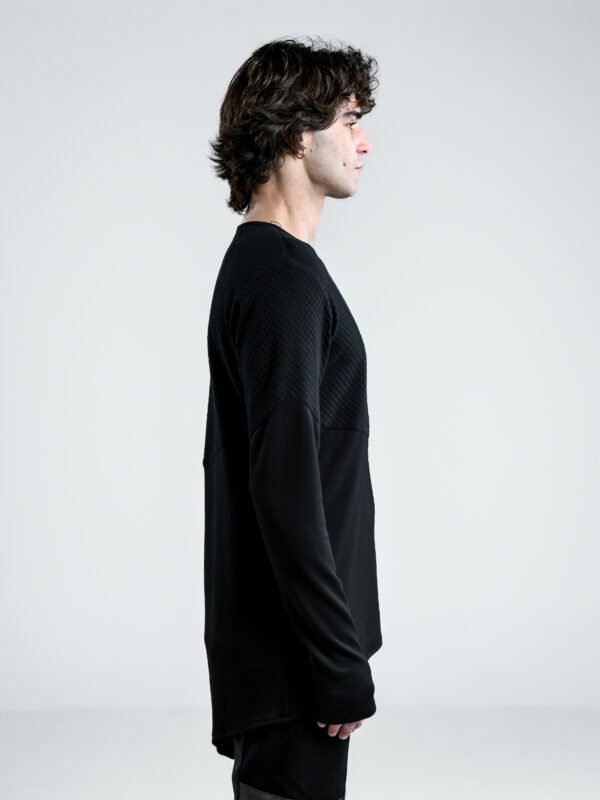 Prism Tunic, men's black asymmetric long-sleeve tunic shirt with textured front panel, diagonal seam and extended hem.